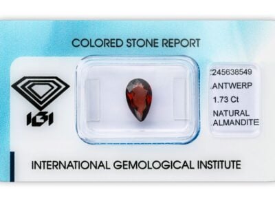 almandin 1.73ct reddish orange s IGI certifikátem