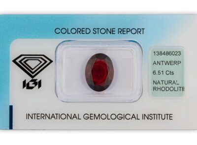 rhodolit 6.51ct brownish purplish red s IGI certifikátem