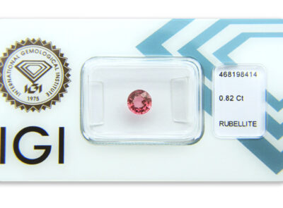 rubelit 0.82ct orangy purplish pink s IGI certifikátem