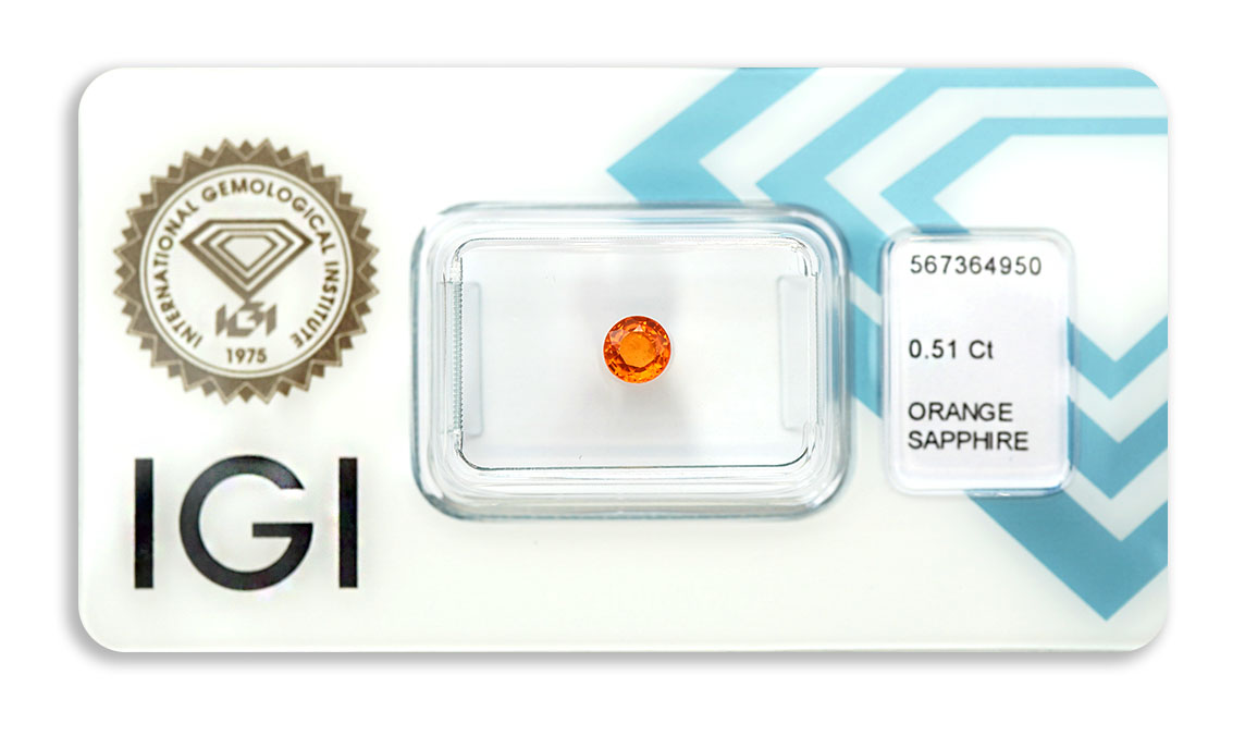 safír 0.51ct deep yellowish orange s IGI certifikátem