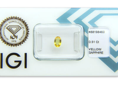 safír 0.51ct orangy yellow s IGI certifikátem