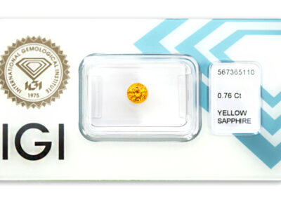 safír 0.76ct deep orangy yellow s IGI certifikátem