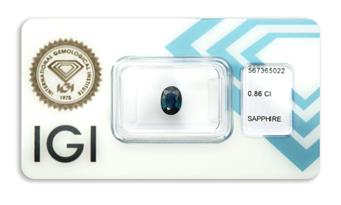 safír 0.86ct deep blue s IGI certifikátem
