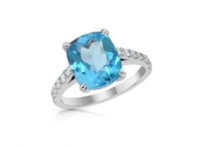 zlatý prsten s topazem 4.72ct blue s IGI certifikátem